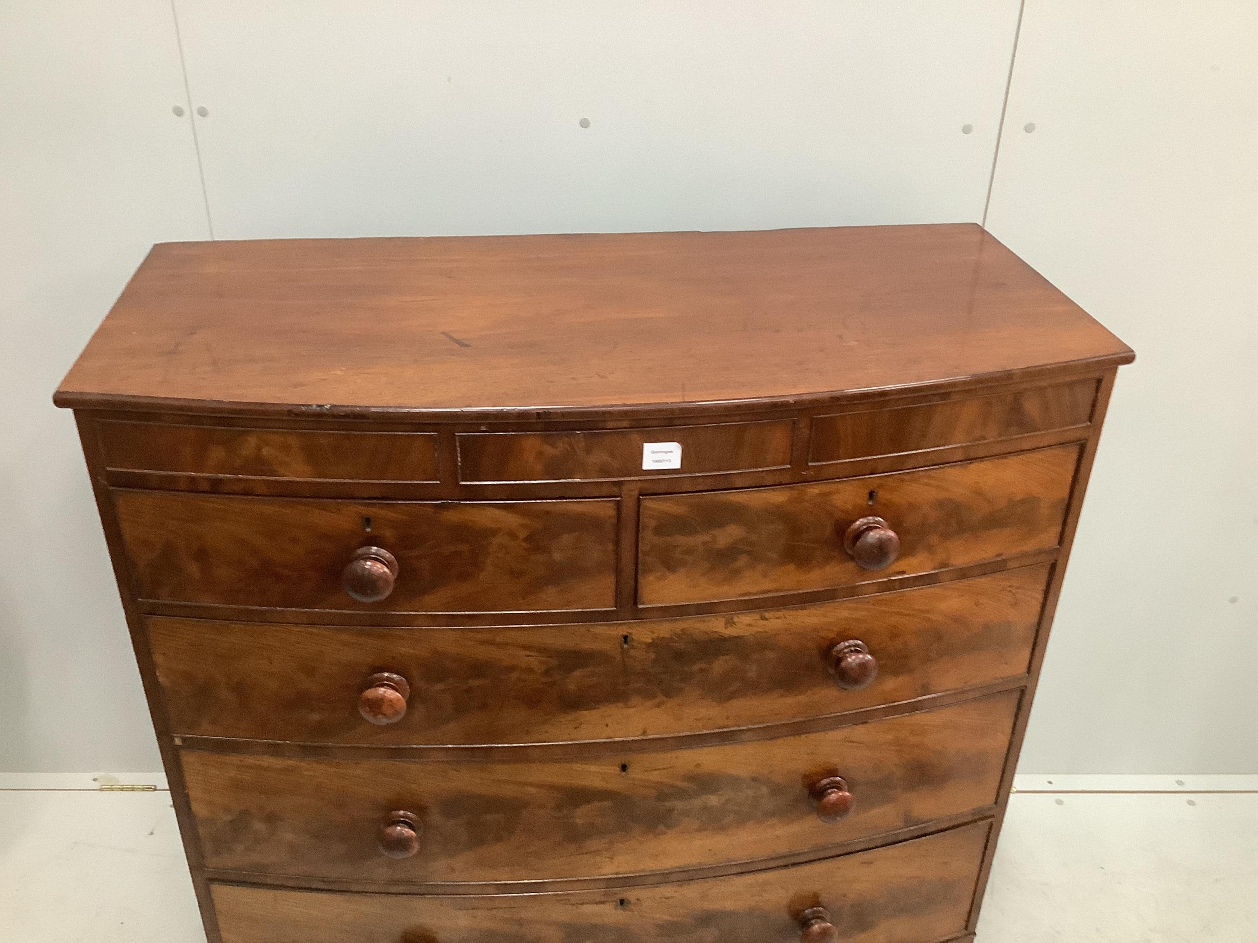 An early Victorian mahogany bowfront chest, width 117cm, depth 54cm, height 123cm. Condition - fair